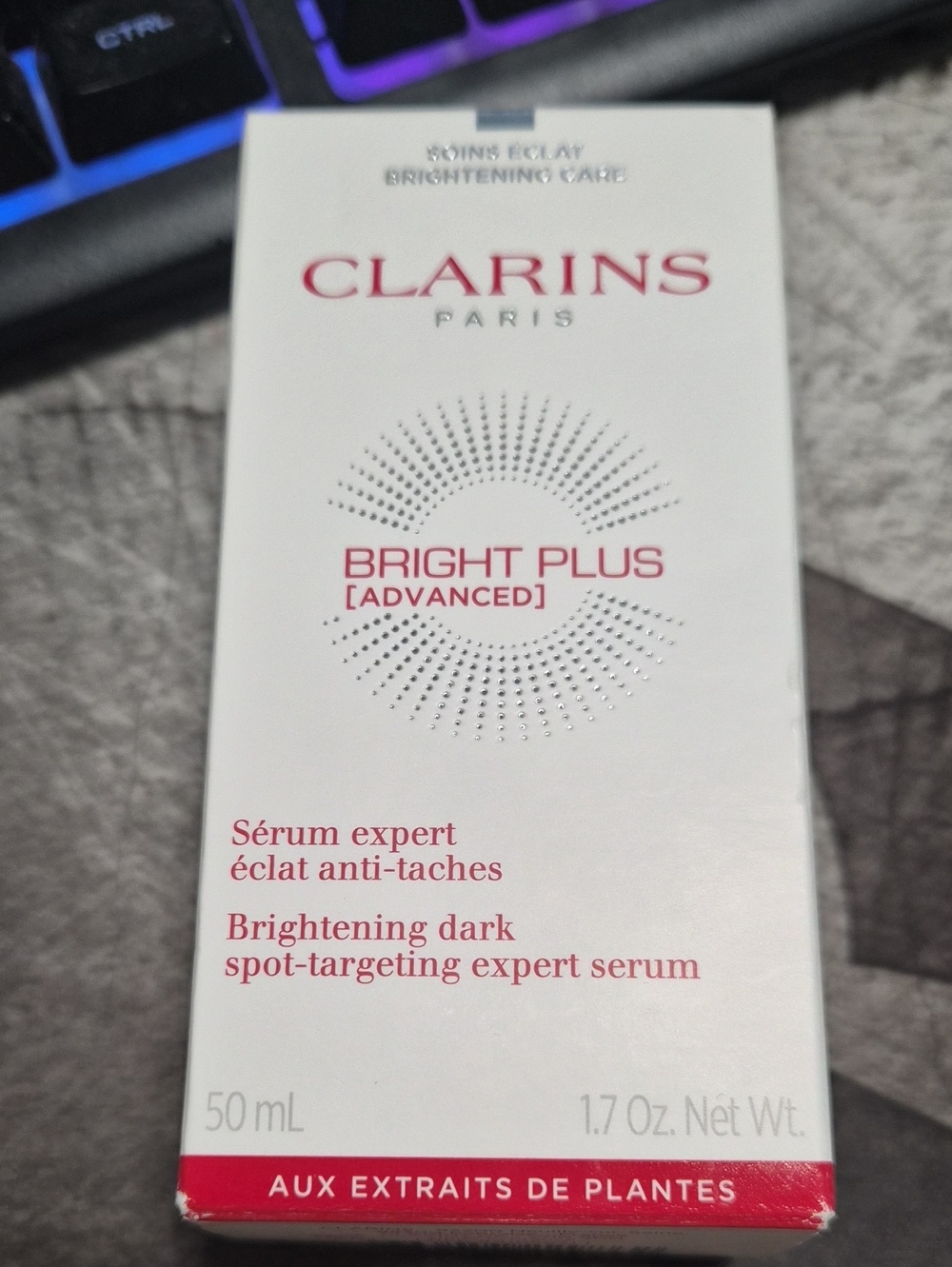 Clarins Bright Plus Advanced Brightening Serum White Box with Red Accents.1.7oz